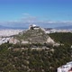 Aerial Drone Footage of Mount Lycabettus Surrounded By the Streets of Athens - VideoHive Item for Sale
