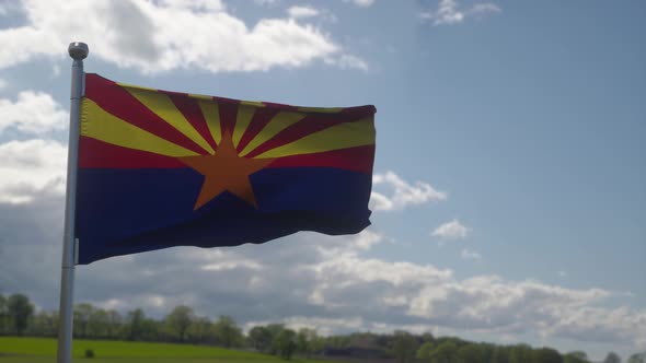 Flag of Arizona State Region of the United States Waving at Wind