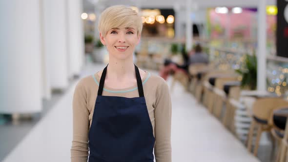 Portrait Female Worker in Cafe