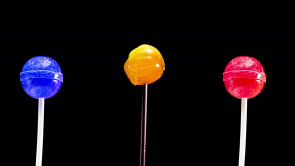 Stop Motion Lollipops Animation On Black Background