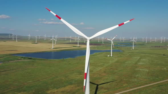 Aerial View of Windmills on Wind Farm in Rotation