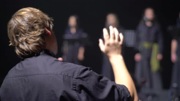 A Male Conductor Conducts on Stage. Kyiv. Ukraine