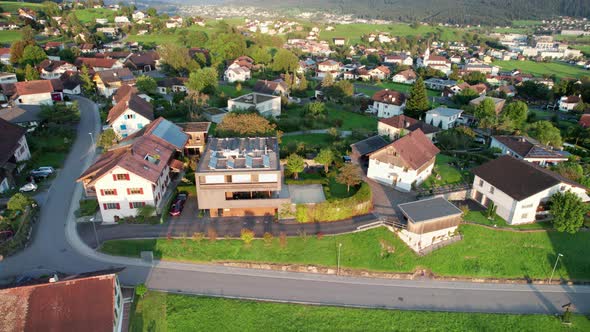 Aerial View of Liechtenstein with Houses on Green Fields in Alps Mountain Valley