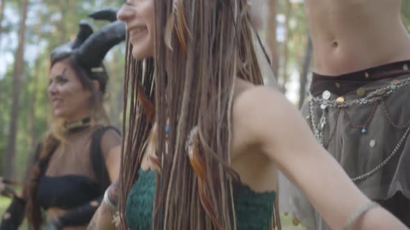 Group of Women Dancers with Make-up and in Mystical Costumes Dancing