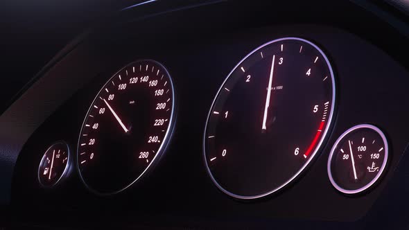 Car Speedometer Picking Up Speed at Night