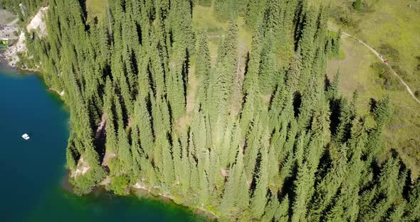 Kolsay Lake Among Green Hills and Mountains.