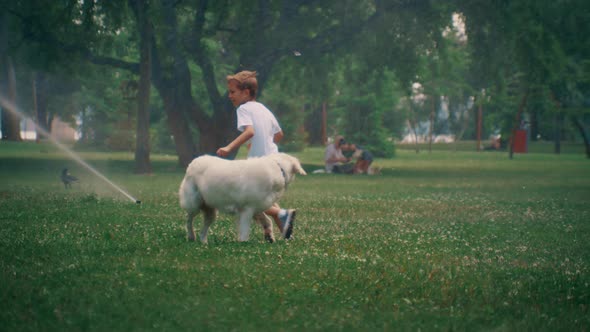 Little Boy Running Cute Dog