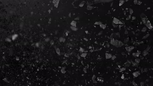 Super Slow Motion Shot of Coal Explosion Isolated On Black Background at 1000 Fps