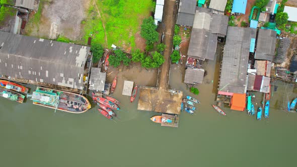 A drone is flying over a fishing village