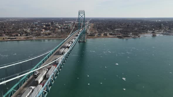 Truckers crossing USA - Canda border over Ambassador bridge in Detroit, aerial view