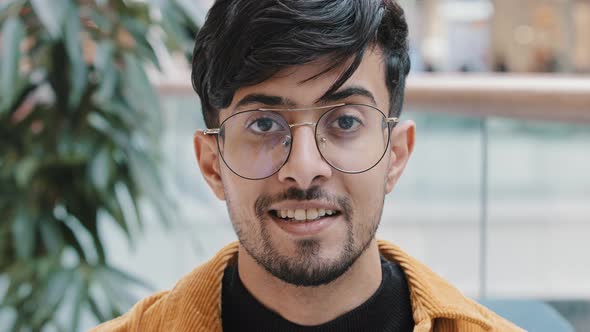 Male Portrait Closeup Young Happy Indian Man with Glasses Looking at Camera Smiling Dental Smile