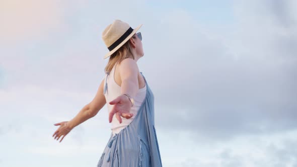 Slow Motion View of Smily Cheerful Woman Happily Looking Up in the Morning Sky