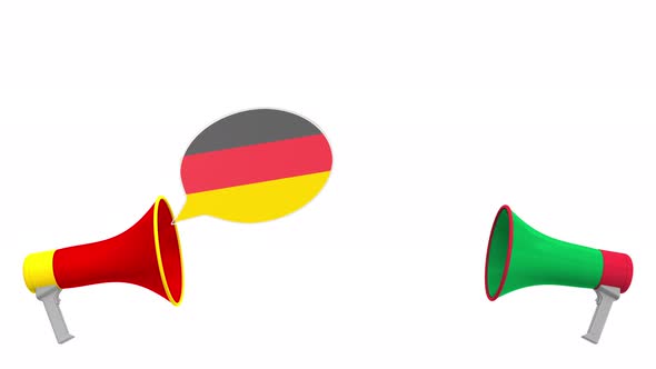 Flags of Italy and Germany on Speech Balloons From Megaphones