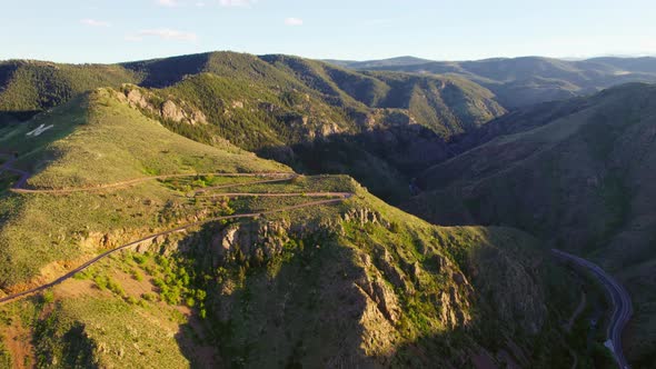 Drone Shot Circling Around Beautiful Colorado Mountains And Valley During Beautiful Golden Hour Suns