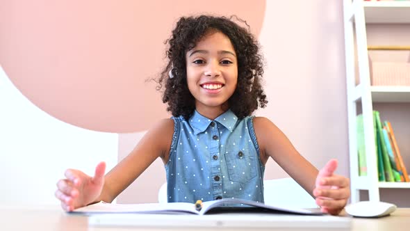 Cute African Girl Is Studying Online