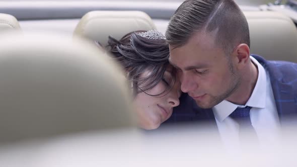 Slow Motion Young Bride with Closed Eyes on Fiance Shoulder