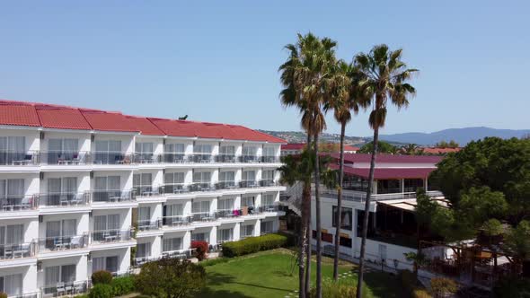 Accommodation Hotel Open For Tourists In Kusadasi, Turkey. aerial pullback