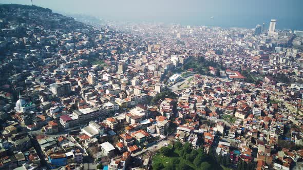 Drone view on poverty slum district and muslim mosque