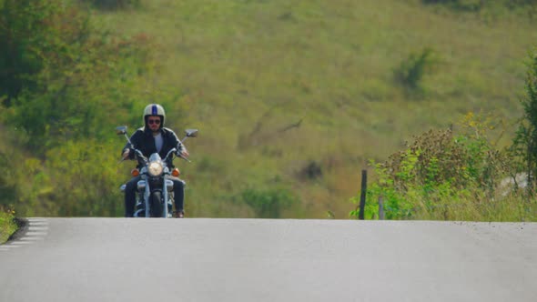 Riding a motorcycle in the countryside