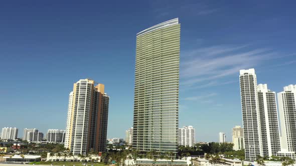 Sunny Isles Beach skyscrapers on blue sky