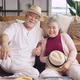 old asian senior couple packing cloth and stuff for a trip togethers - VideoHive Item for Sale