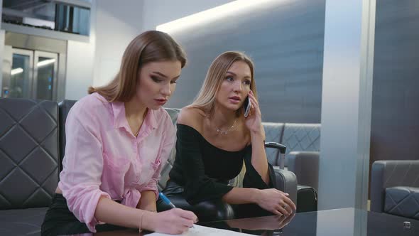 Two Women Working