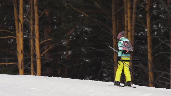 Amateur Skier Girl on a Lift