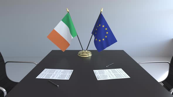 Flags of Ireland and the European Union on the Table alt