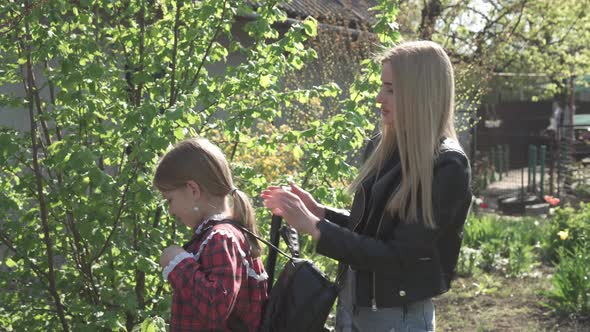 The Older Sister Sends a Girl a Primary School Student to School