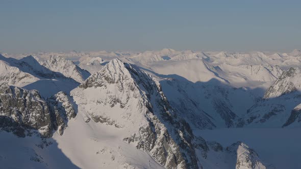 Aerial Panoramic View of Canadian Mountain Covered in Snow