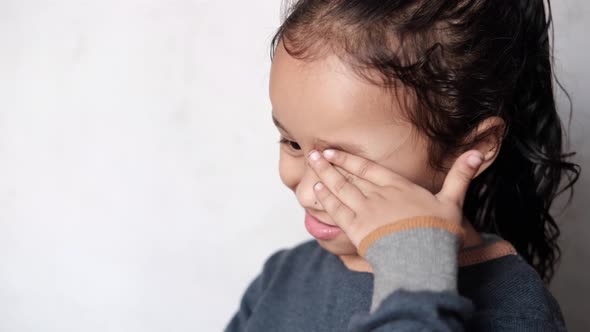 a Upset Child Girl Looking Down