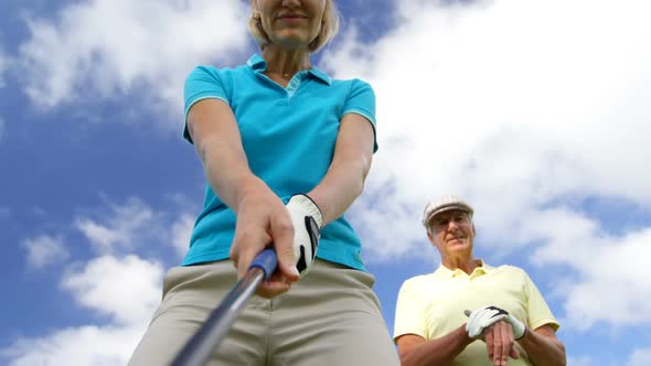 Golf players playing together