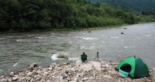 Fishing and Recreation in the Mountains Near the Stormy River