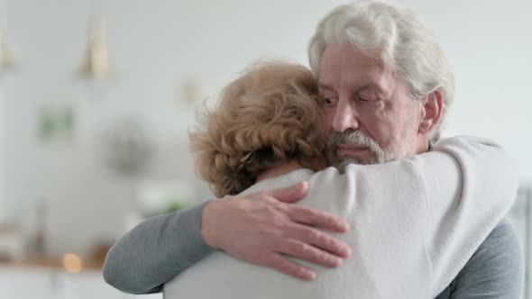 Man Hugging and Consoling Crying Partner