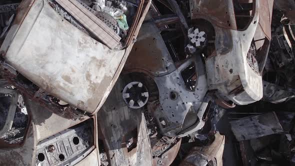 Vertical Video of a Dump of Destroyed Cars During the War in Ukraine