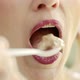 Woman Eating a Spoon of Ice Cream - VideoHive Item for Sale
