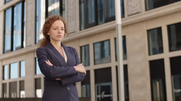 Young Caucasian Businesswoman Standing Outside