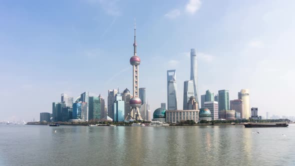 Timelapse of city skyline from day to night in Shanghai china