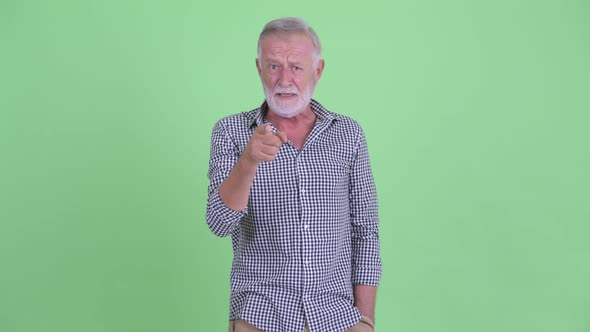 Angry Senior Bearded Man Pointing at Camera