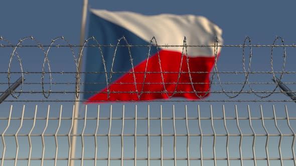 Barbed Wire Against Waving Flag of the Czech Republic