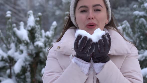 Woman Throws Snow