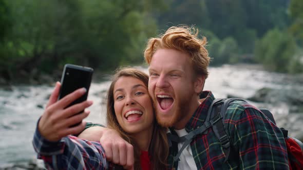 Couple Taking Selfie on Smartphone