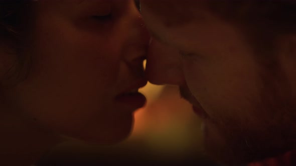 Passionate Couple Kiss Each Other on Romantic Date Closeup