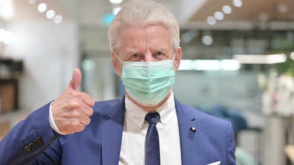 Senior Old Businessman with Face Mask Showing Thumbs Up 