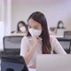 Asian creative business team working after lockdown with protective prevention face mask. - VideoHive Item for Sale
