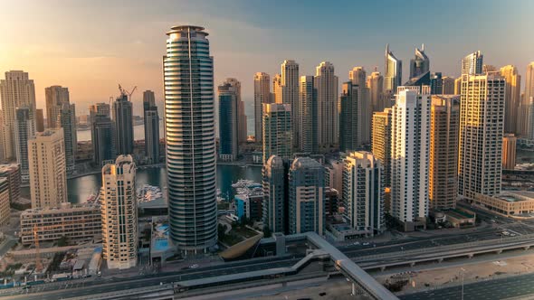 Beautiful Aerial Top View at Sunset Timelapse of Dubai Marina and JLT in Dubai UAE