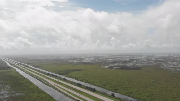 Florida Everglades, Alligator Alley hover toward storm