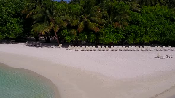 Drone view seascape of tropical seashore beach by ocean with sand background