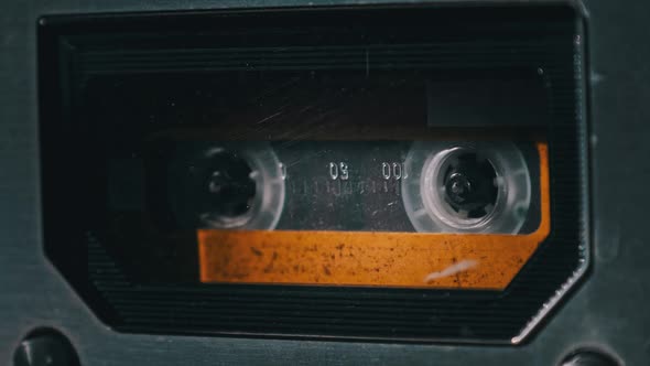 Vintage Audio Cassette Rotates in Old Tape Recorder