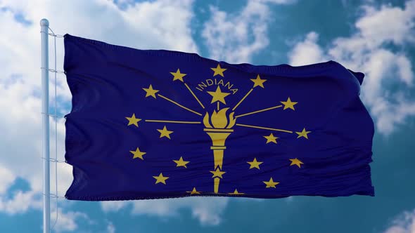 Indiana Flag on a Flagpole Waving in the Wind in the Sky